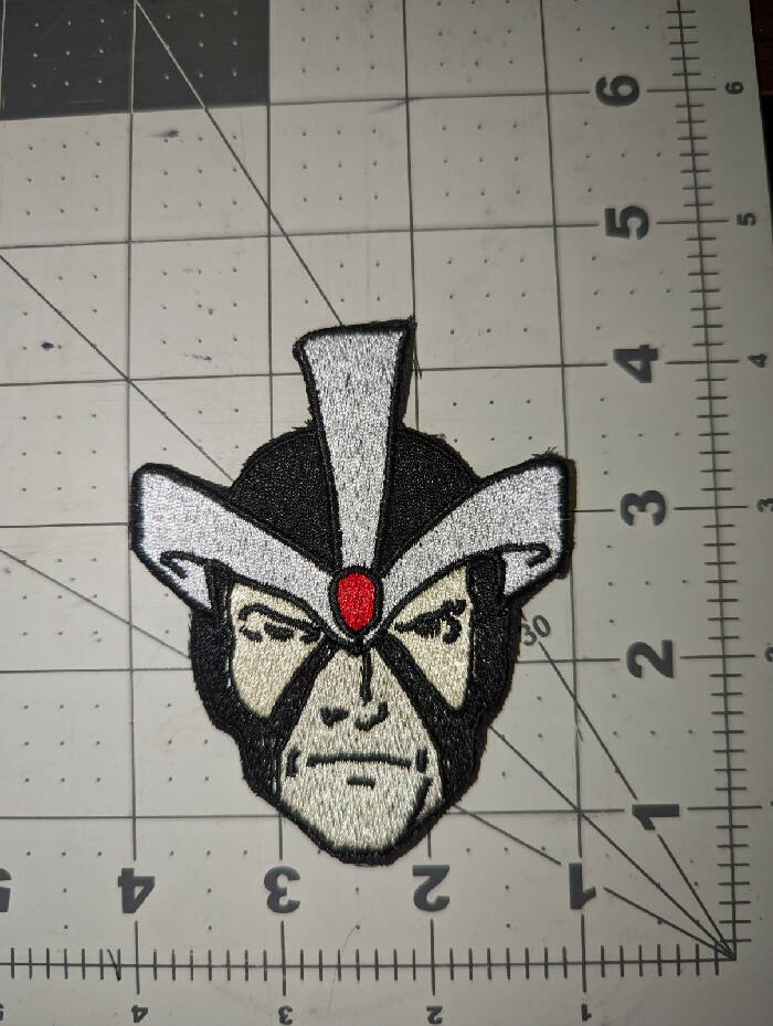Disarray Face Iron On Patch