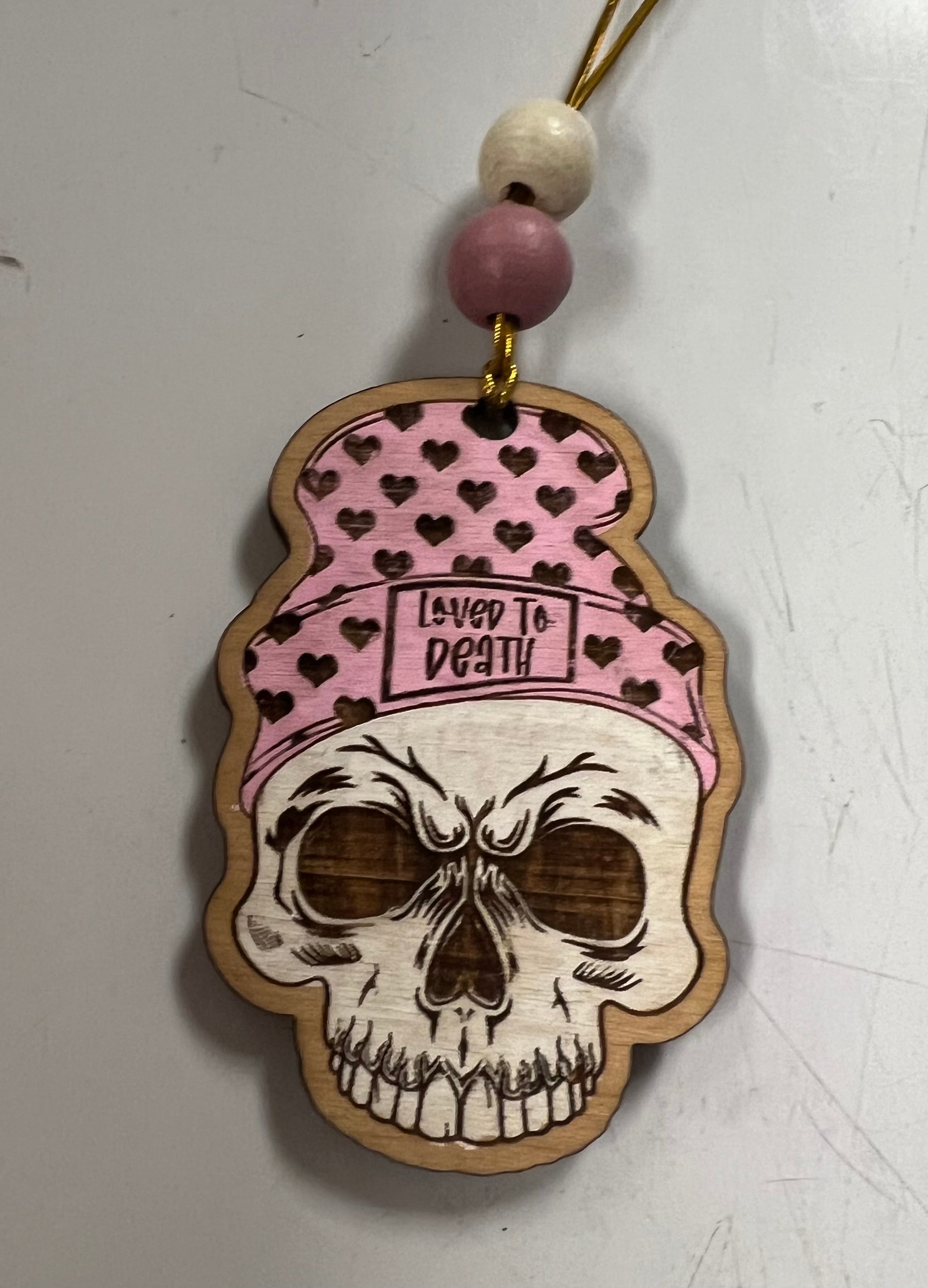 Loved to Death Ornament
