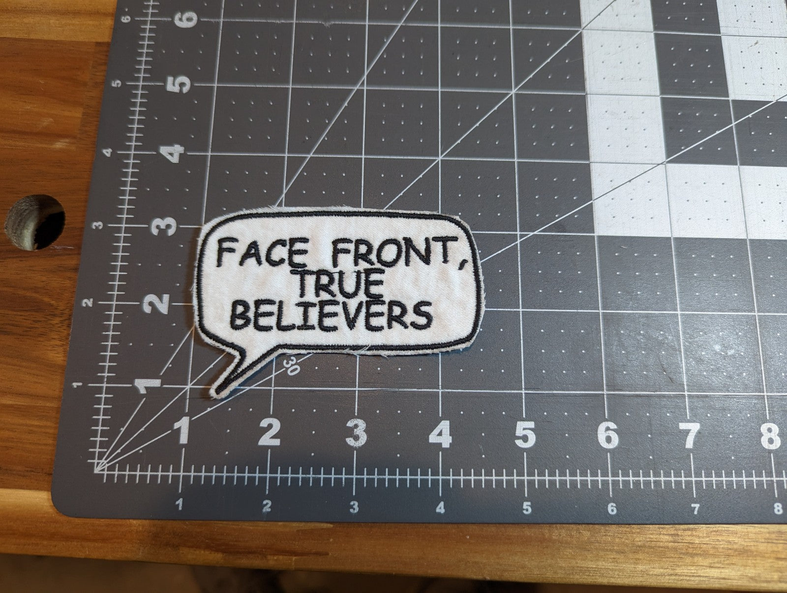 Face Front True Believer Iron On Patch