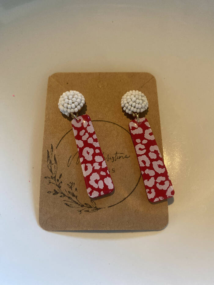 Red cheetah bars with white bead stud
