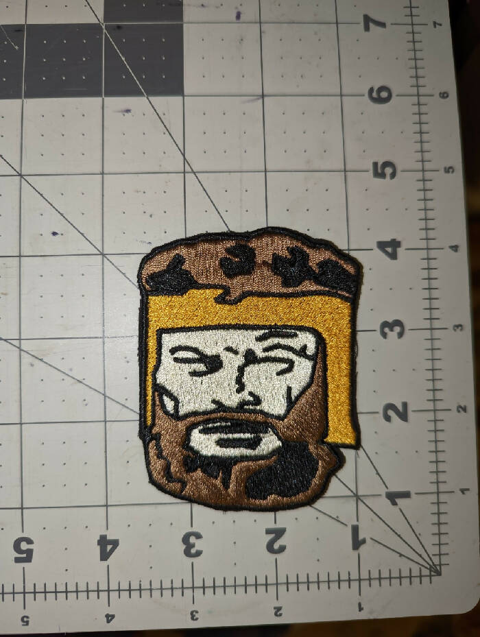 Herakles Face Iron On Patch