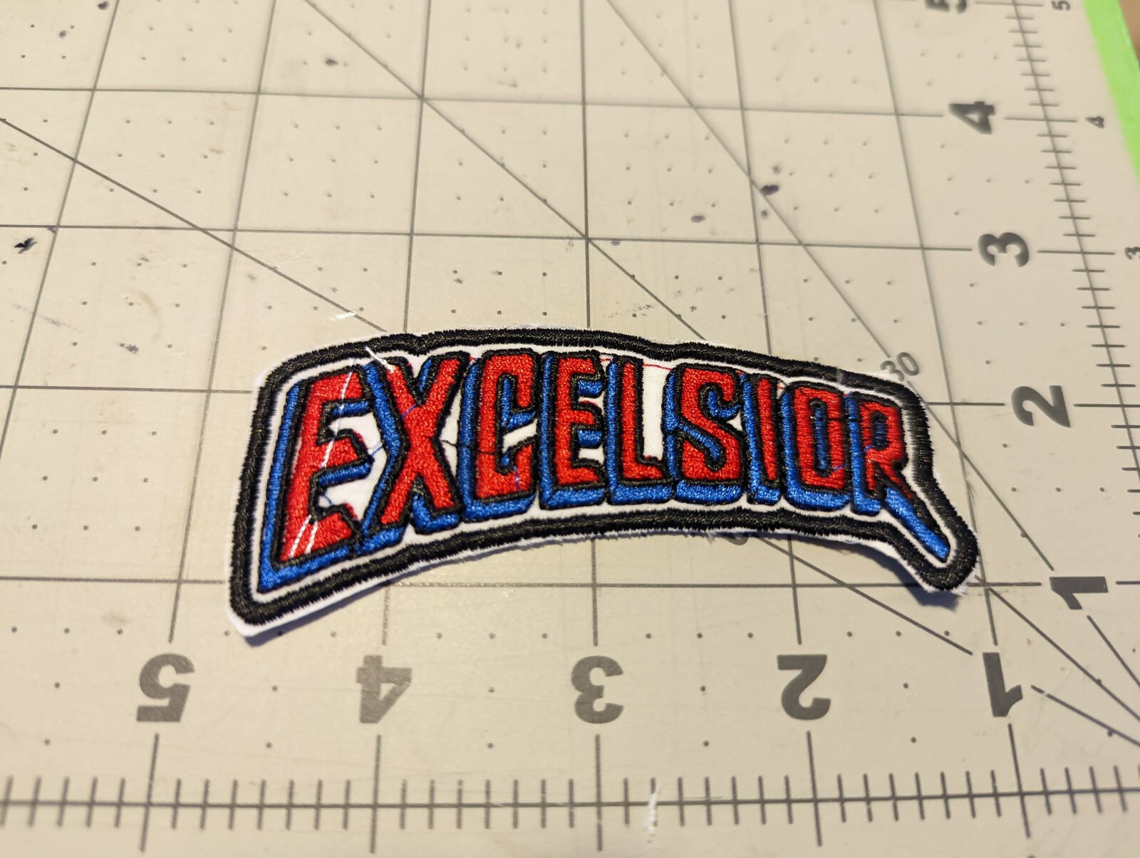 Excelsior Swoop Iron On Patch