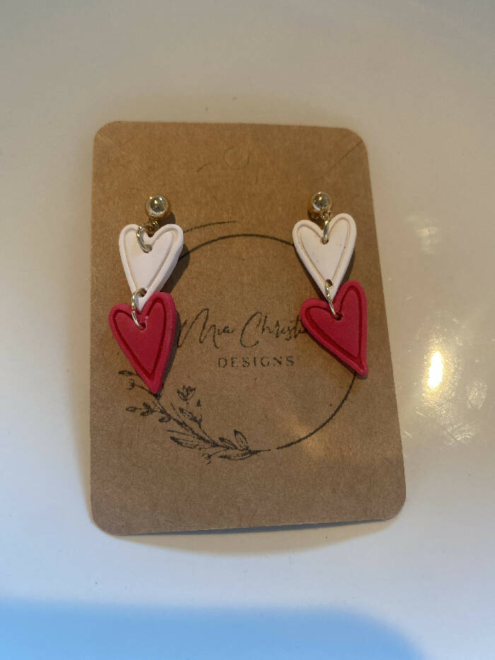 White and hot pink heart dangles