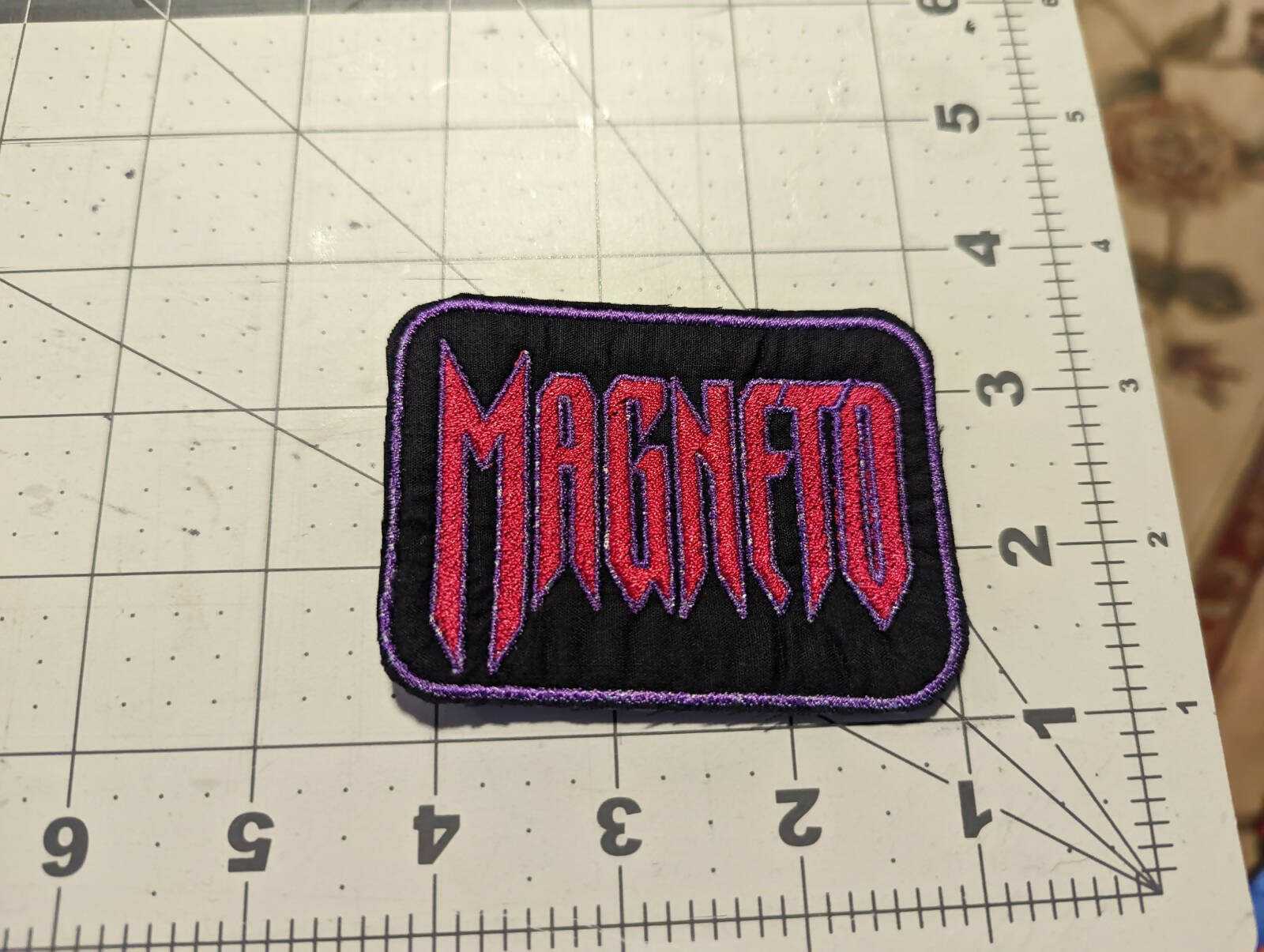 Magneto Logo Iron On Patch