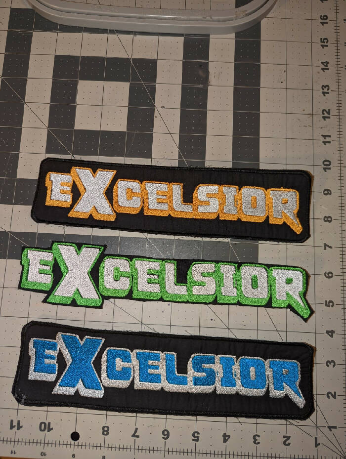 X-celsior Logo Iron On Patch